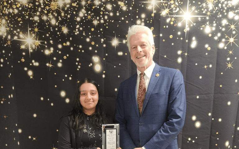 Arushi Nath receiving the Youth Leader Award 2026 from MPP Chris Glover